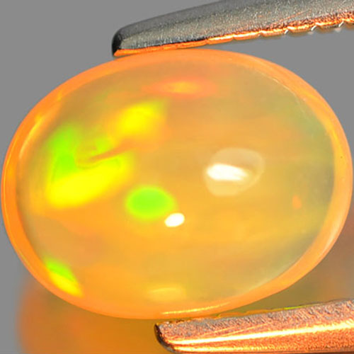 2 OPALES JAUNES ET MULTICOLORES D' ETHIOPIE : 6.7-6.8 mm x 5 mm